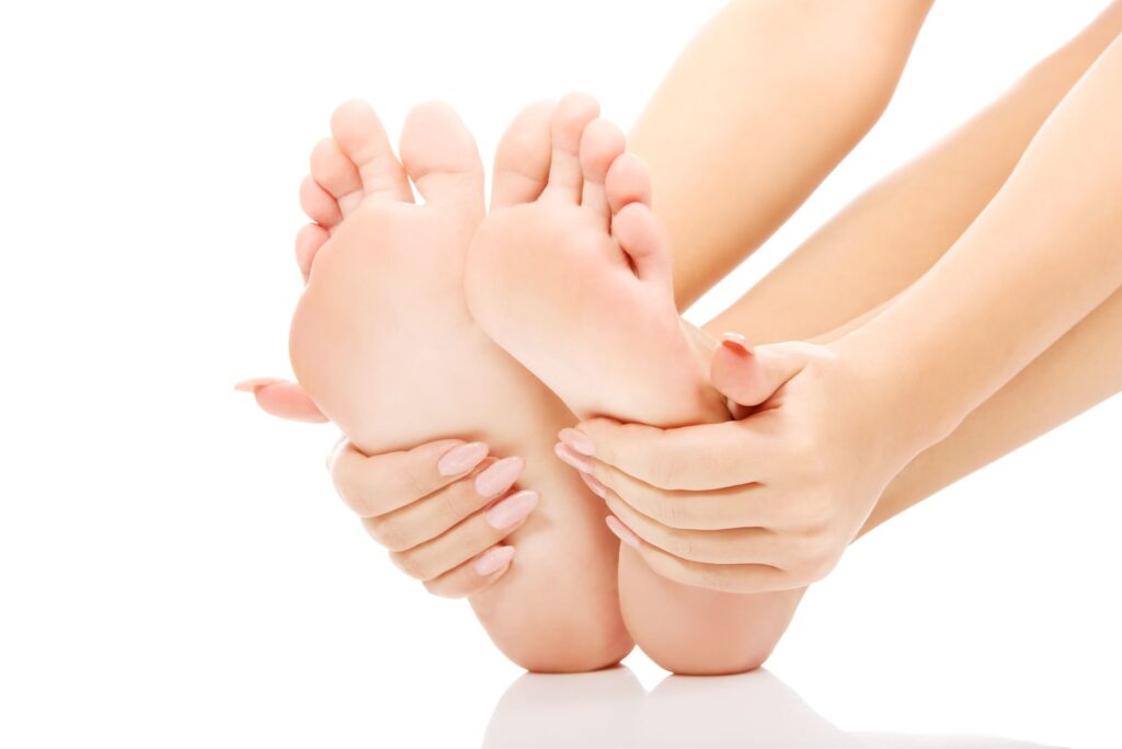 Hands gently holding clean feet